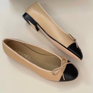 CHANEL Beige with Black Cap-Toe Bow Ballet Flats